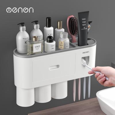 China Minimalist factory outlet selling new multifunctional hole free toothpaste squeezing tool with cup toothbrush shelf for sale