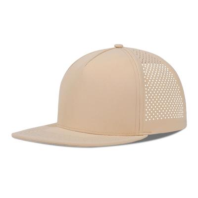 China Quick Dry Laser Golf Performance Snapback Hat Perforated Flat Brim Cap for sale