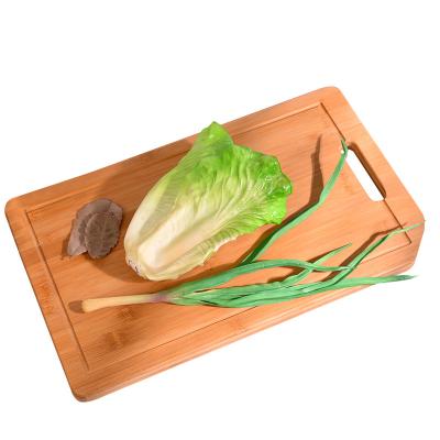 China TAOTAOJU Kitchen Utensils Sustainable Custom With Handle Chopper With Sink Steak Food Board Bamboo Cutting Board for sale