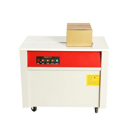 China Table Top Pedal Industrial Electric Universal Motor Dual Wheel Portable Low Speed Semi Automatic Strapping Machine for sale