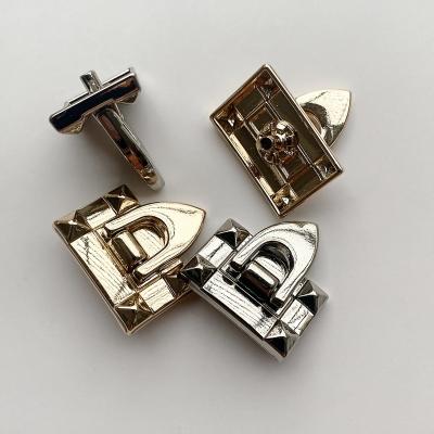 China Sustainable Wholesale brand engrave logo Zinc Alloy four parts spring Women's Decorative clasp metal button snap Luggage buttons for sale