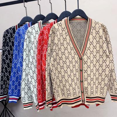 China Anti-wrinkle 2021 winter knitted cardigan sweater ladies loose long sleeve sweater jacquard plus size women's sweater for sale