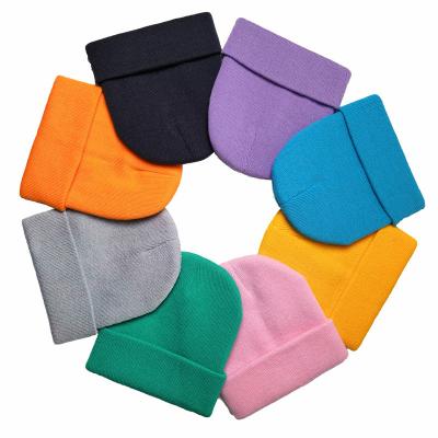 China COMMON Wholesale in Bulk Custom Logo Print Solid Color Man and Woman Beanie Knitted Hat for sale