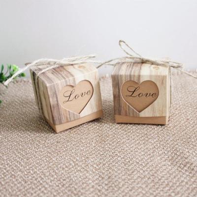 China Recycled Materials Wedding Decorations Vintage Heart Kraft Paper Candy Box Wedding Gifts For Guests Party Bags Favors Packaging Bags With Handles for sale