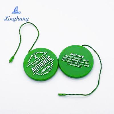 China Viable biodegradable PLA plastic clothes lock pin twine loop tags garment seal rope etiqueta label tag for sale