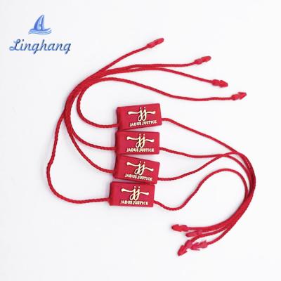 China Sustainable Plastic Hanging Accessory Attachment Logo Plastic Head Seal Tag with Polyester Rope Apparel Label String for sale
