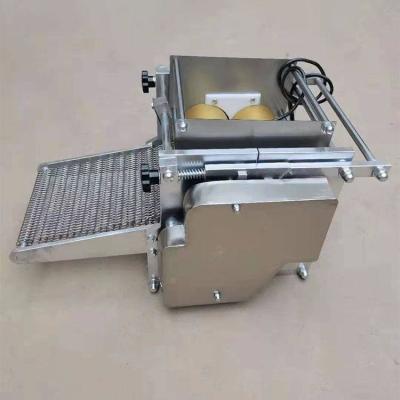 China Maschine zur Herstellung von voll automatischen industriellen Maiskuchen zur Pressen von Brot und Getreide zu verkaufen
