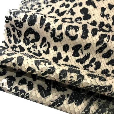 China Wholesale stretch sequin fancy animal printed double sided mermaid sequin fabric for women dress. for sale
