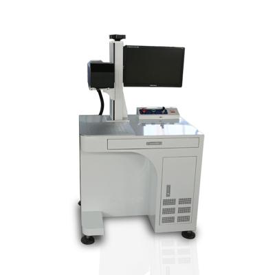 China 20 Watt Fiber Laser Marking Machine Air Cooled CO2 Laser Marking Machine For Cutting Paper Card Leather Jeans for sale