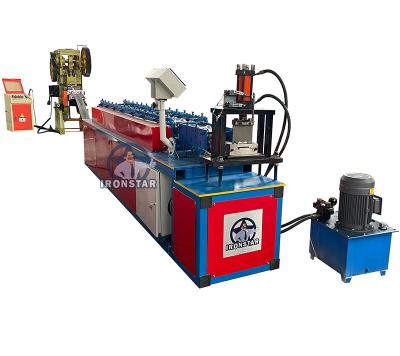 China 111mm Punching Hole Roller Shutter Door Roll Forming Machine 4KW for sale