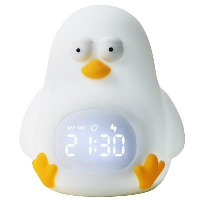 China Animal Shaped Silicon Led Night Light With Digital Table Alarm Clock Up Toys For Kids Room for sale