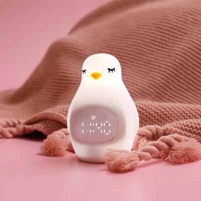 China Led Alarm Clock with Penguin Silicone Multi-functional Usb Charging with Small Night Light for sale
