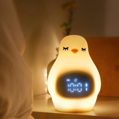China Penguin Electronic Table Alarm Clock Children Bedroom Silicone Night Light Kids Sleep Trainer for sale