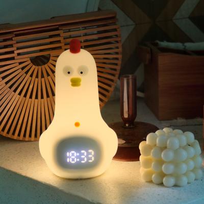 China Kung Fu Chicken Kid Alarm Clock With Adjustable Silicone Night Light Intelligent Sleep Aid for sale