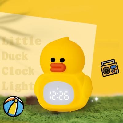 China Portable LED Duck Alarm Clock With Night Light Rechargeable And Remote Controlled For Baby Kids for sale