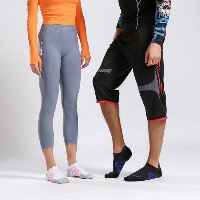 China Logo Socks Anti Slip Breathable sock wholesale custom QUICK DRY breathable non slip football sports grip socks for sale