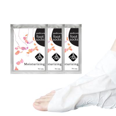 Китай УЛЬТРАФИОЛЕТОВЫЕ защитные носки Pedicure ног младенца, Moisturising носки для коллагена ног продается