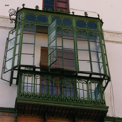 China Ventana de la bahía de hierro forjado Verde Metal Sala de sol Ventana de vidrio Villa Casas de diseño moderno popular en venta