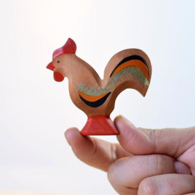 China Montessori embroma el juguete de madera tablero del pollo de los animales de madera hechos a mano en venta