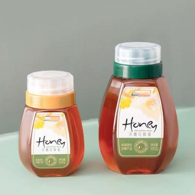 Cina bottiglie di condimento di plastica di 300g 500g 1000g Honey Bottles Reflux Inlet Sealing in vendita