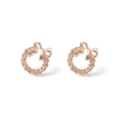 China Korean Personalized New Women's Pearl Bow Stud Earrings Diamond Earrings for sale