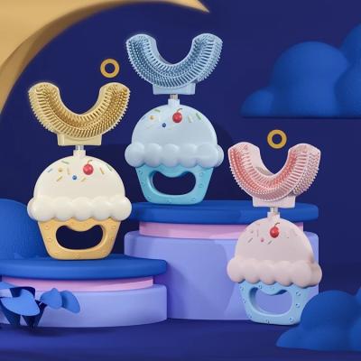 China New hot selling cake home food grade silicone 360 degree manual oral hygiene toothbrush u shape for kids for sale