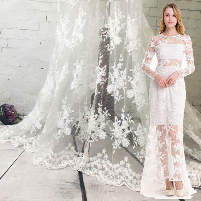 China Viable New Style Black French Tulle Lace Fabric Embroidered Transparent Net White Flower Lace For Wedding Dress Sewing Accessories for sale