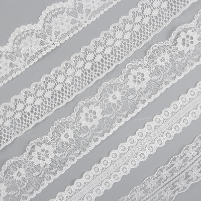 China Viable Viable Bridal Flower Embroidery White Trim Lace Fabric Nylon Lace Trim For Women Dress Clothing for sale