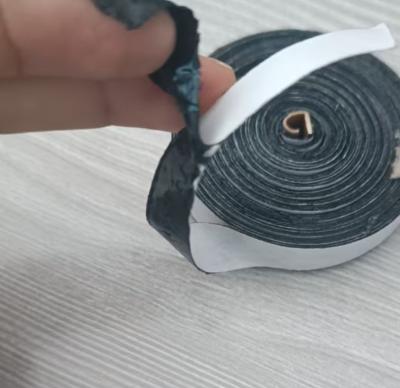 China 0.7mm Thickness Butyl Rubber with PE NET Double Coated Self-adhesive Tape for Sealing Window Glass for sale