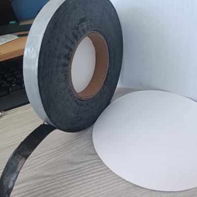 China 0.5mm-0.7mm Thickness Butyl Tape with PE NET Double Coated Self-adhesive Tape for Sealing Window Glass for sale