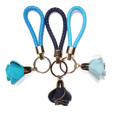 China De hand stikte Blauw Rose Personalized Leather Keyring Brass Geplateerd Goedgekeurd Ce Te koop