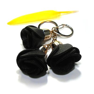China Zwart 36g-Leer Rose Keychain, Hand Gestikte Promotieleersleutelringen Te koop