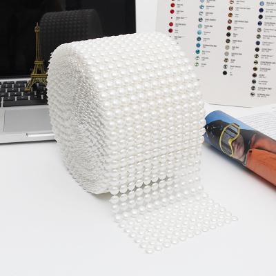 China Durable Factory Direct 12 Rows Pearl Rhinestone Mesh Hollow Wide Ribbon Decoration For Wedding Party for sale