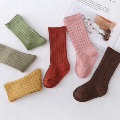 China Wholesale Sporty Colorful Sports Anti Slip School High Knee Cotton Socks For Kids for sale