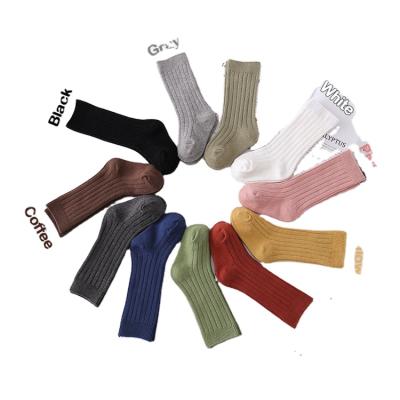 China Custom Made Sporty Logo Sporty Casual Spanish Style Long Knee Cotton Kids Socks for sale