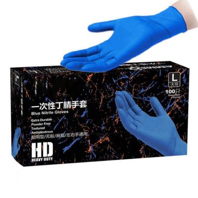 China As luvas descartáveis Textured do nitrilo azul cirúrgico pulverizam livre à venda