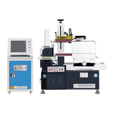 China Building material stores table travel 450*550mm cnc edm wire cutting closed edm machine price DK7745 with 0.01mm high precision for sale