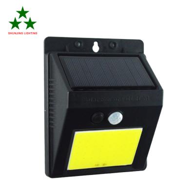 China High Bright Garden Motion Sensor Light ip65 Outdoor Waterproof Cob 48 Leads ABS Solar Wall Light for sale