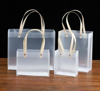 China Cheap Affordable Handled New Years Birthday Wedding Favor Party Gifts Bags Single PVC Cosmetic Bag Foldable Handbag With Handle for sale