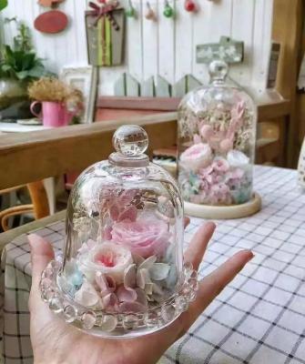 China Unique Europe Wedding Favors Candy Chocolate Container Preserved Mini Flower Cake Glass Bell Jar For Guests for sale