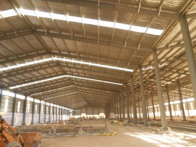 China Clear span fabricated steel barn prefab metal hall for sale