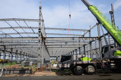 China Pre-engineered Metal Structural Prefab Storage Warehouse Hangar With Free Atchitectural Support for sale