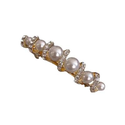 Chine Les pinces à cheveux dorés à finition mate sont l'accessoire idéal pour toutes les occasions. à vendre