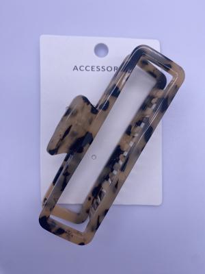 Cina Clips acrilici per capelli durevoli con effetto colore leopardo in vendita