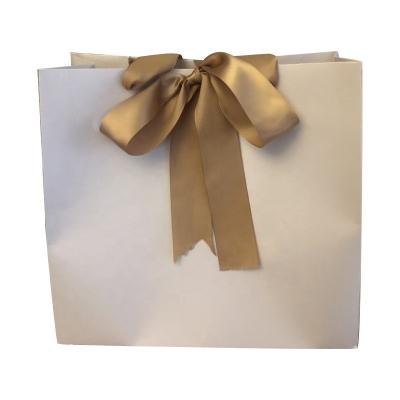 China Saco de papel personalizado da compra do ofício da cor 100g com punho da fita à venda