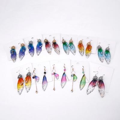 China Fashionable Anillo Cicada Butterfly Wing Asymmetric Simulation Earrings For Women Beautiful Long for sale