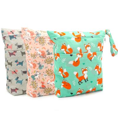 China 2021 New Water Resistant Baby Diaper Wet Dry Clutch Bag with Handle and Strap for sale