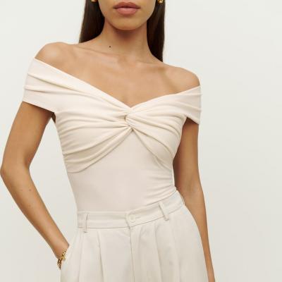 China Minimalist Women Twist Slim Fit Front Stretchy V Sleeve Short Top Turned Neckline Off-shoulder Blouse for sale