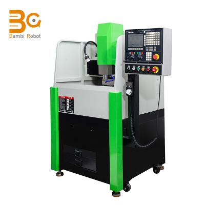 China Hard Materials 4040 CNC Drilling And Engraving Machine Small CNC Four Or Five Axis Tapping Engraving Machine Tool And Milling Machine Desktop for sale