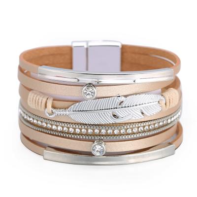 China Wholesale Bohemian Ethnic Wide Feather Woven Leather Bracelet Edge Style Ladies Bracelet Fashion and Texture Factory Style for sale